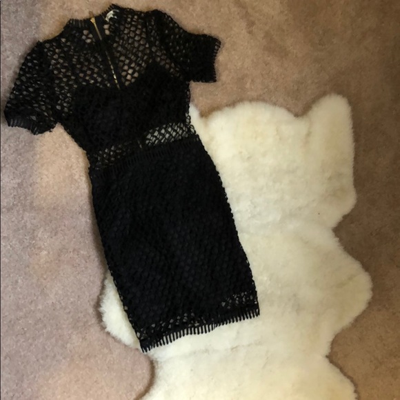 Dresses & Skirts - Sexy spin on little black dress, with gold accent.